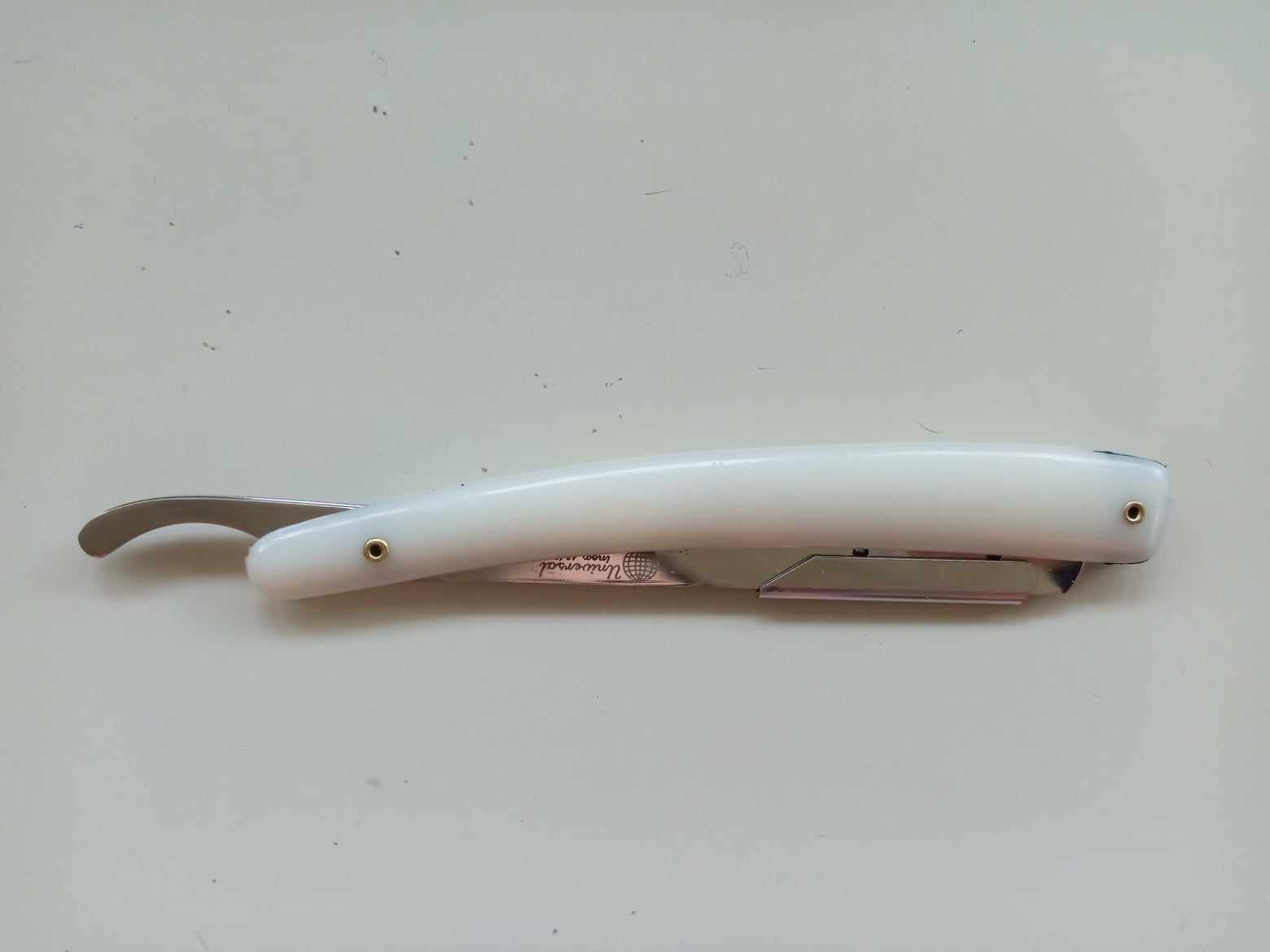 Rasoio mezza lama inox manico in ABS bianco 1149 - immagine 2